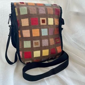 Colorful crossbody purse. It’s from Reign Vermont, and is fun and original.